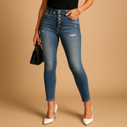 Anastasia ripped slim fit jeans in mid-blue denim, styled with a black top, black shoulder bag and white heels
