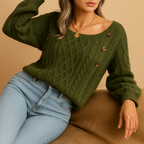 Close-up of the Marielle olive green cable knit sweater showing the diamond knit pattern and side buttons